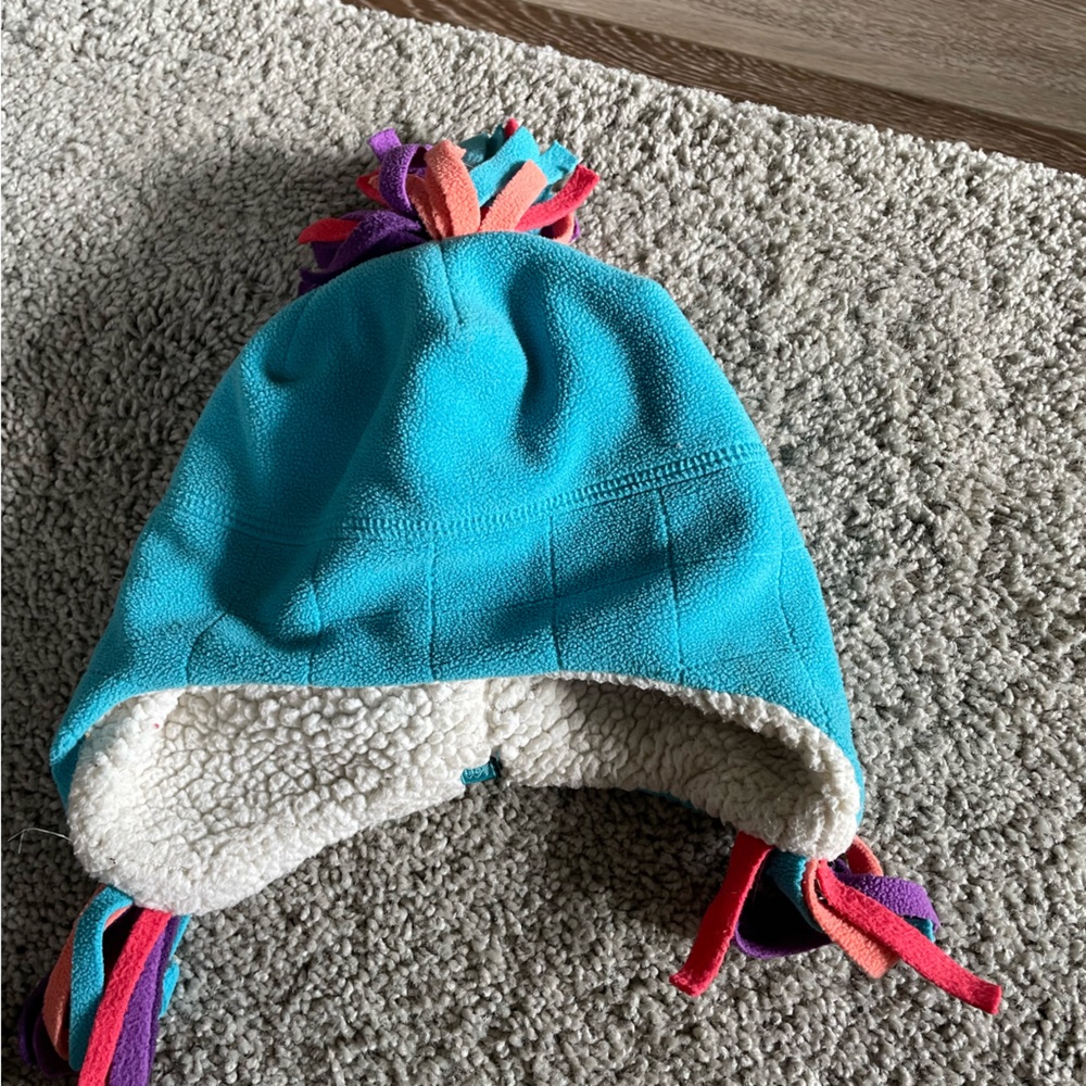 cute pack of little girls winter hats REI and Snozu